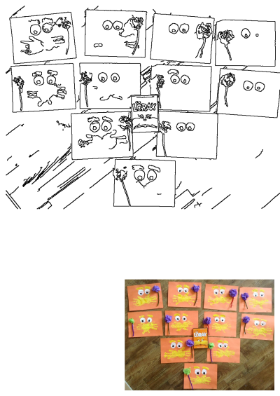 Orange paper crafts of Lorax handprints with purple flowers, and drawn eyes. The artworks on a wooden floor embody the spirit of the book.